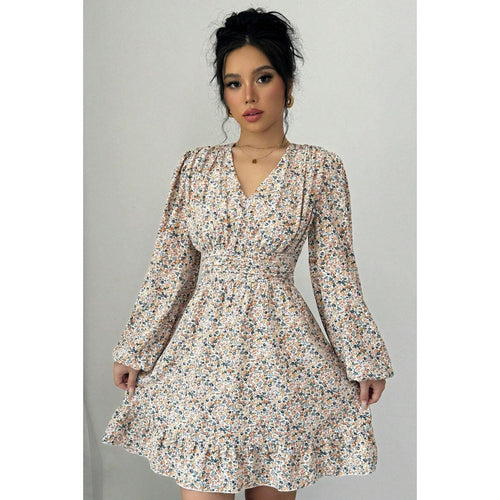 Mini dress adorned with flowers for women with deep V-neck and voluminous sleeves Lune London