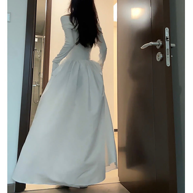 Women's elegant off-shoulder maxi dress with modern strap details Lune London