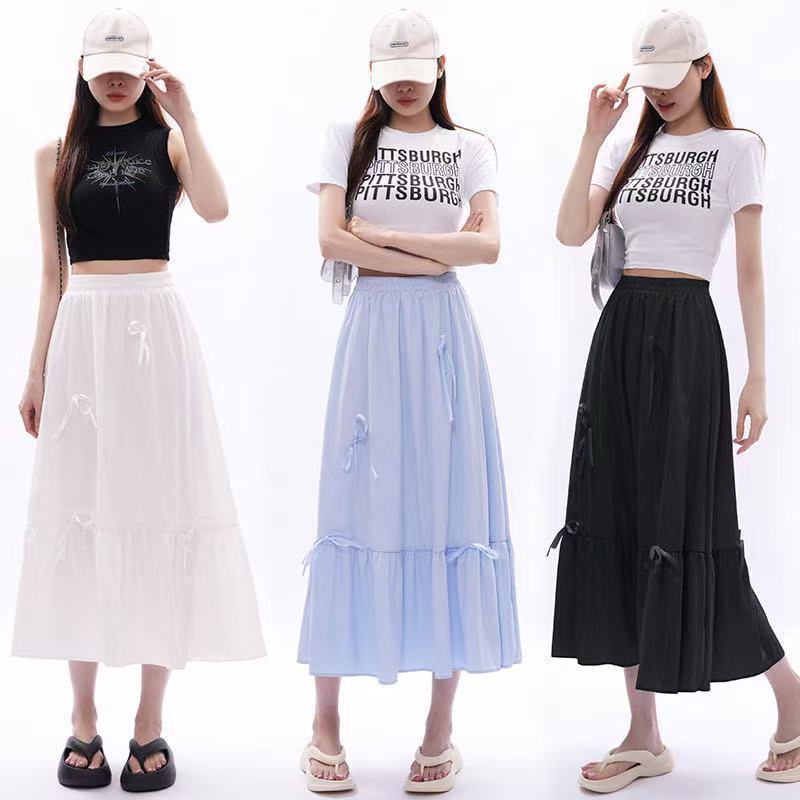 Jupe maxi évasée pour femmes avec nœuds décoratifs