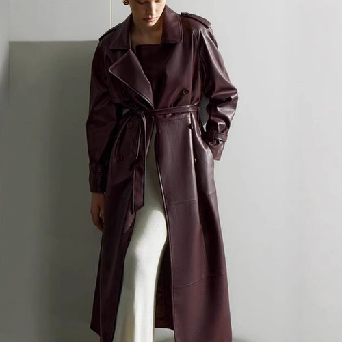 Elegant trench coat in faux leather for women with belt and chic fashion details