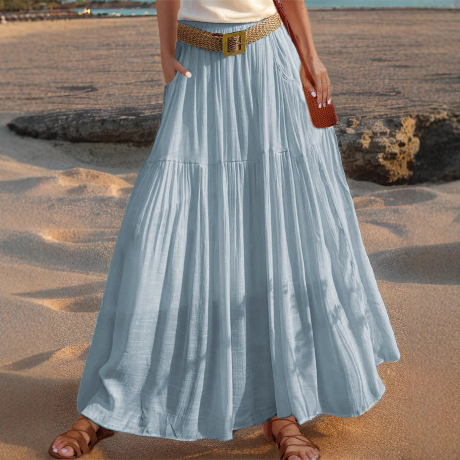 Maxi flared skirt for women with elegant pleated draping and practical pockets Lune London