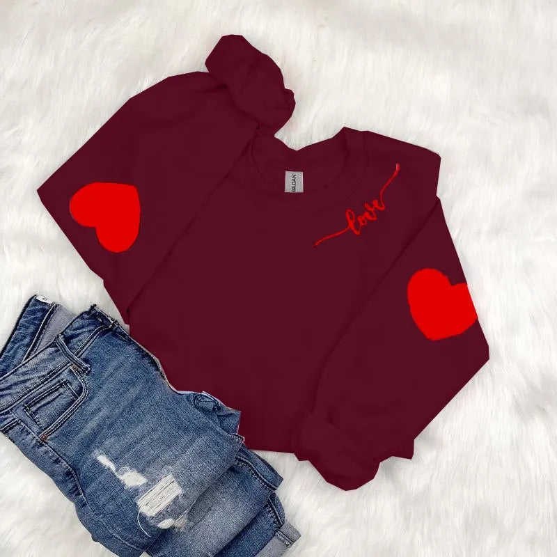 Sweatshirt femme avec design cœur et coupe décontractée Chic & Stil