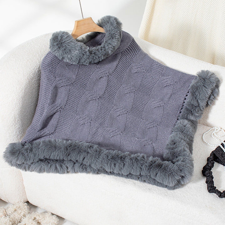 Ladies cozy poncho sweater with soft faux fur trim and cable knit pattern Lune London