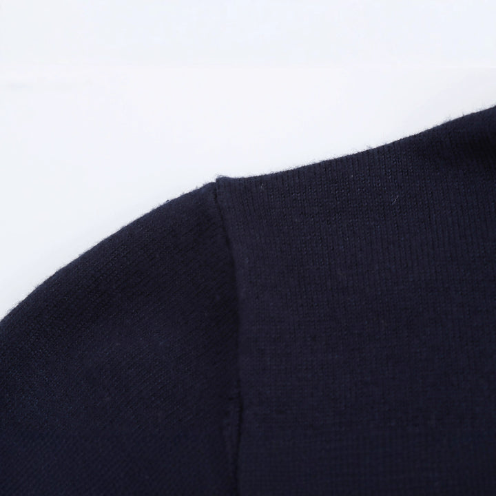 Ladies' turtleneck sweater with elegant button details Lune London