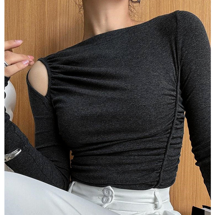 Women's asymmetrical long sleeve shirt with gathering on the side