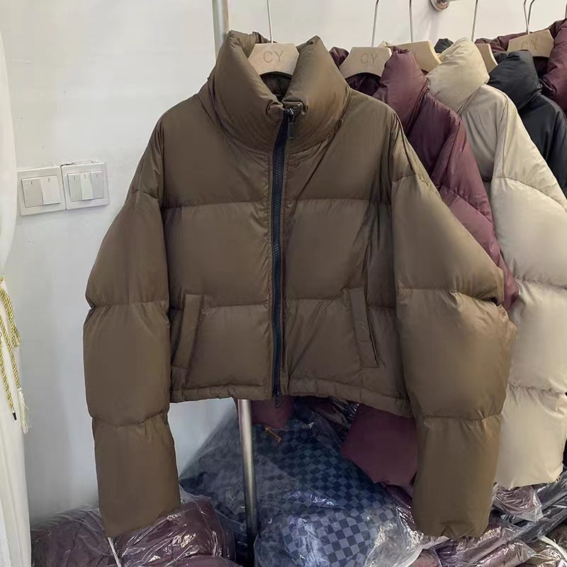 Ladies short functional quilted jacket with high collar and side pockets Lune London