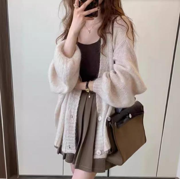 Elegant knit jacket with wide sleeves and refined details Lune London