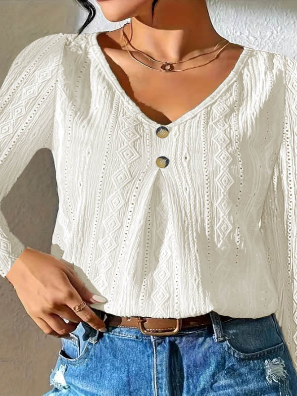 Women’s top with textured surface and elegant button detail Lune London