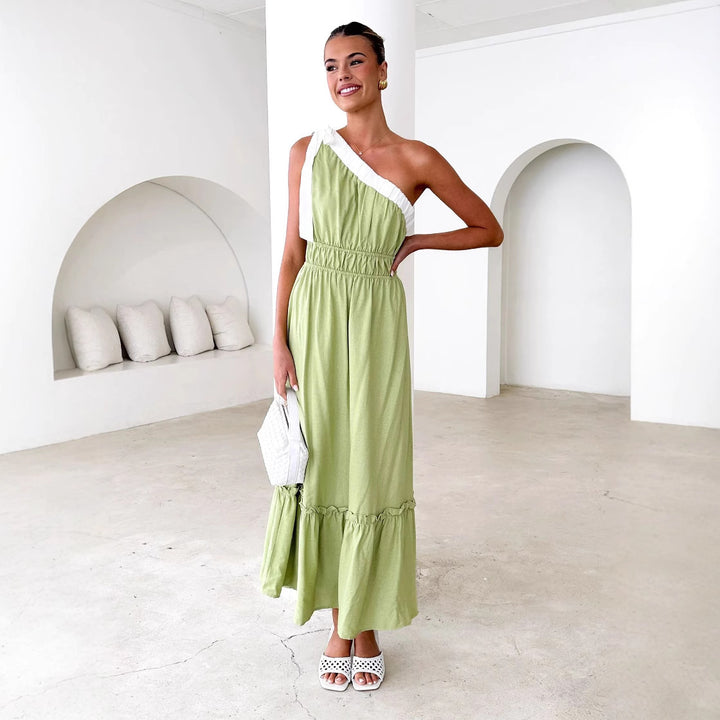 Women's maxi dress with asymmetrical shoulder design and flowing pleated skirt