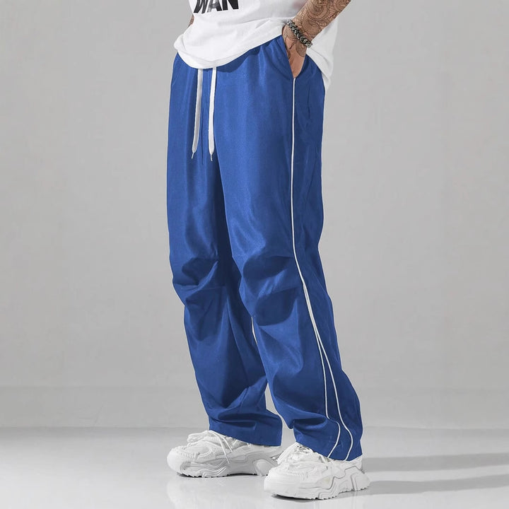 Men's sports pants with elastic waistband and contrasting stripes Lune London