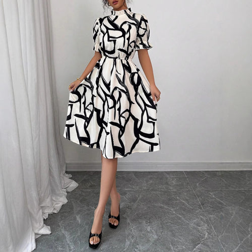 Robe midi élégante pour femmes avec motif de plantes stylé et taille élastique Chic & Stil