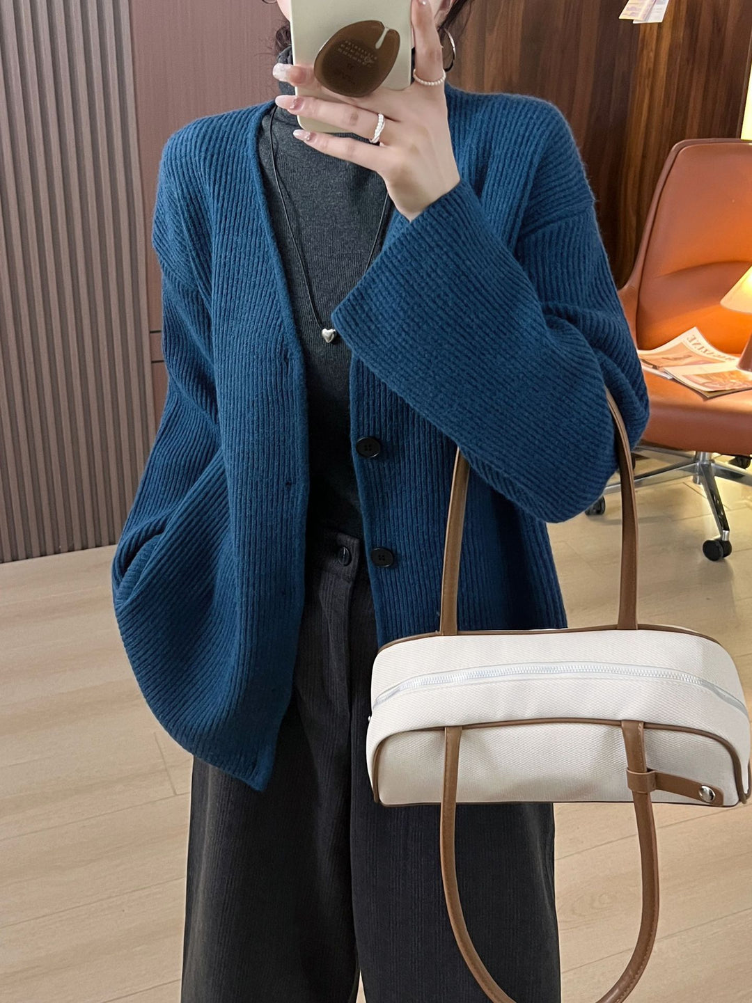Ladies chunky knit cardigan with spacious pockets and deep V-neck Lune London