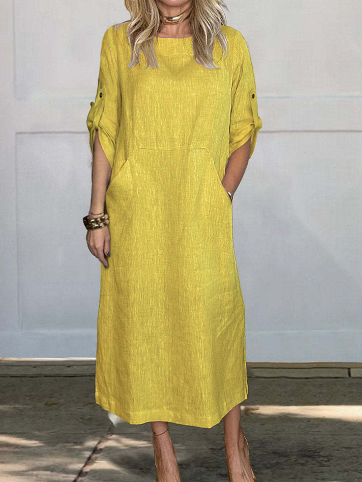 Airy midi dress for women with practical pockets and roll-up sleeves Lune London