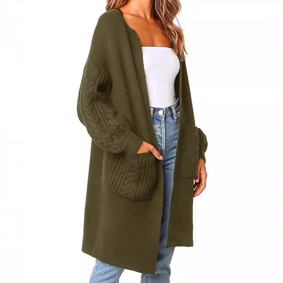 Knitted coat for women with deep V-neck and chunky knit details Lune London