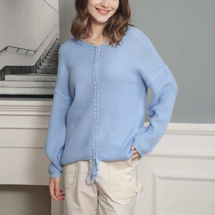 Women's thick knit sweater with an attractive V-neckline and practical drawstring details Lune London