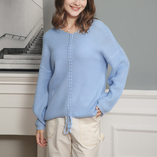 Women's thick knit sweater with an attractive V-neckline and practical drawstring details Lune London