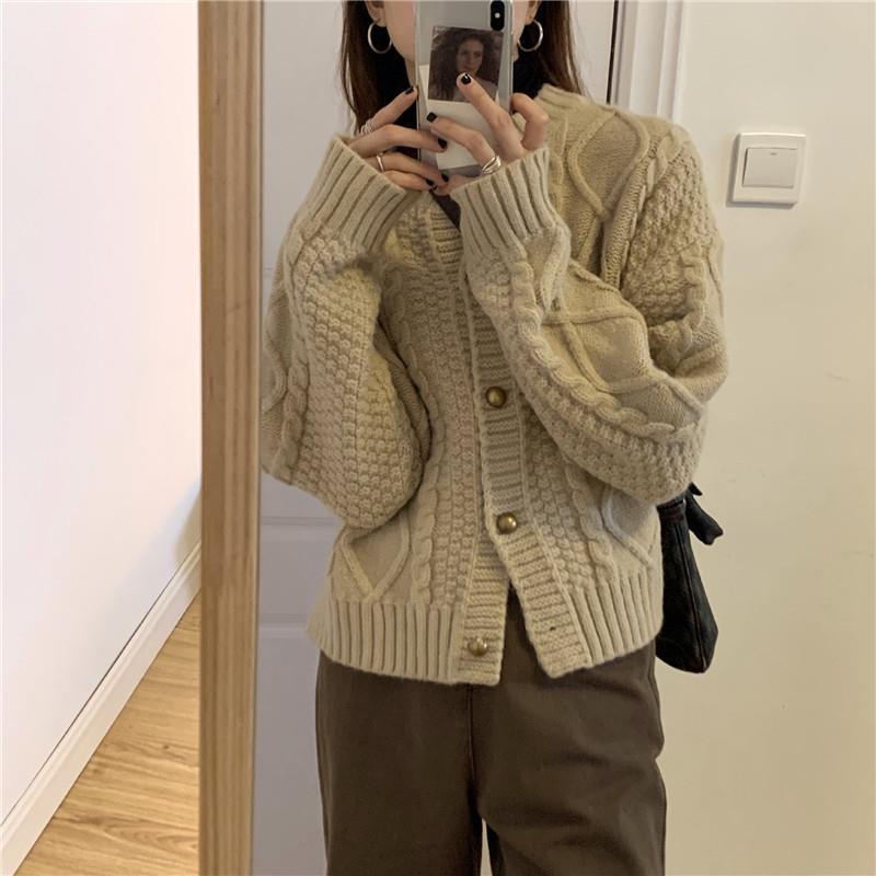Thick knitted cardigan for women with button details and cable knit pattern Lune London