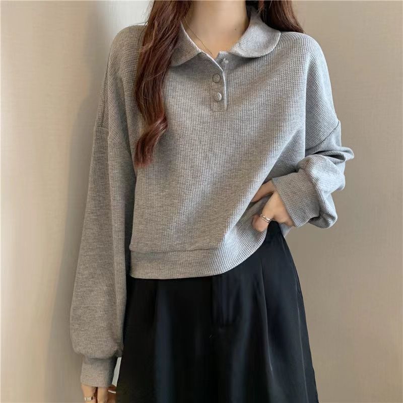 Pull polo décontracté pour femmes avec détails de boutons Chic & Stil