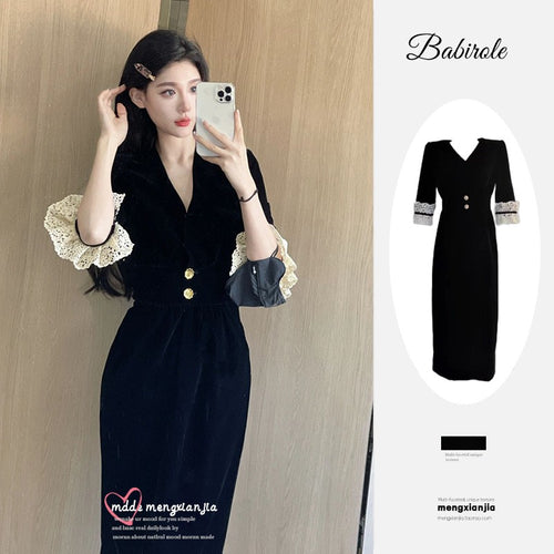 Women's elegant dress with lace sleeves and decorative buttons Lune London