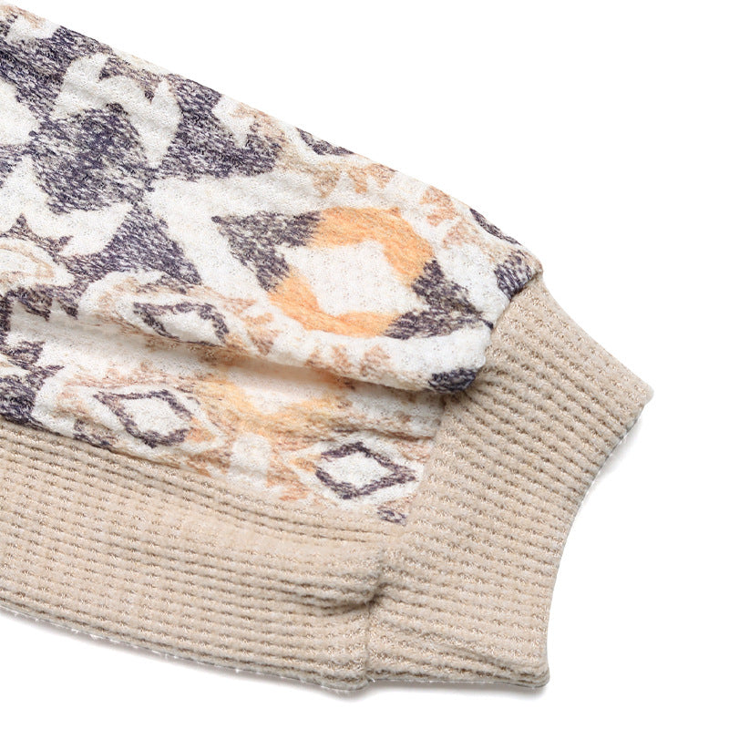 Knitted sweater for women with modern raglan sleeves and a floral pattern Lune London