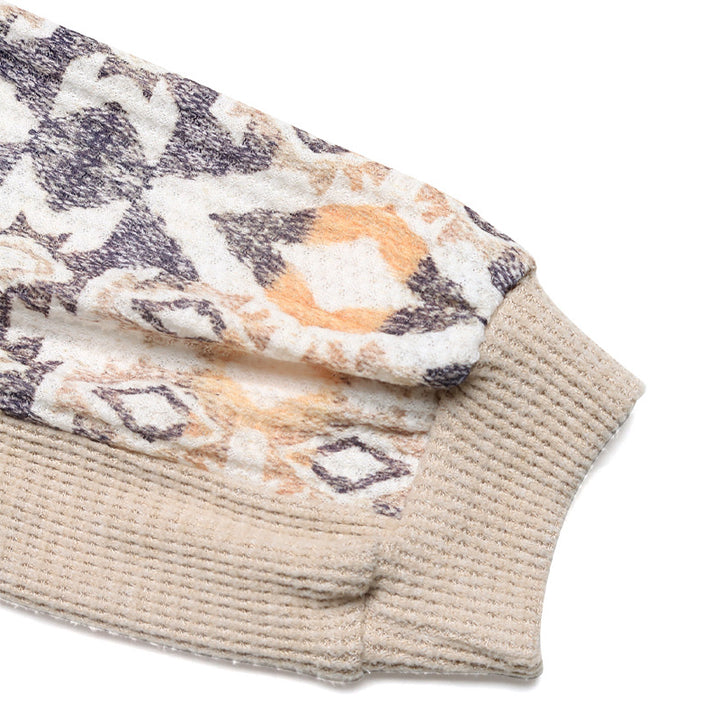 Knitted sweater for women with modern raglan sleeves and a floral pattern Lune London
