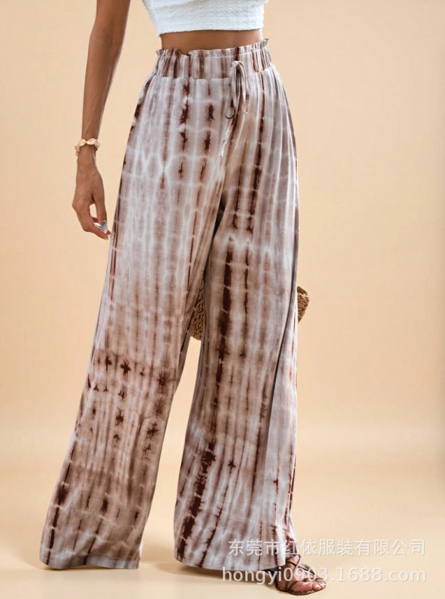 Pantalon d'été ample pour femmes avec taille élastique et motif batik unique Chic & Stil