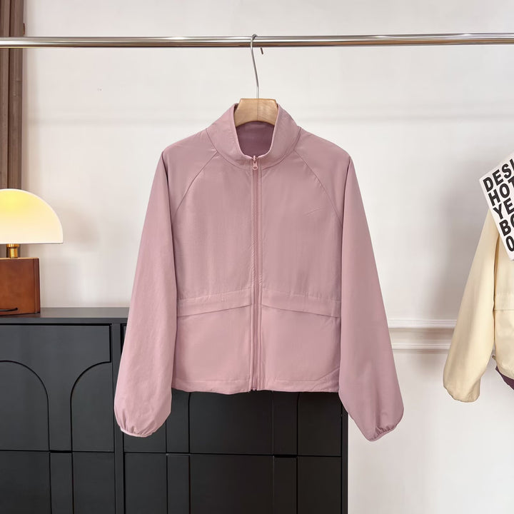 Veste en polaire confortable pour femmes avec col haut et poches pratiques Chic & Stil