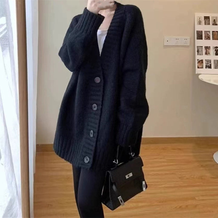 Ladies chunky knit cardigan with voluminous sleeves and buttoned neckline Lune London