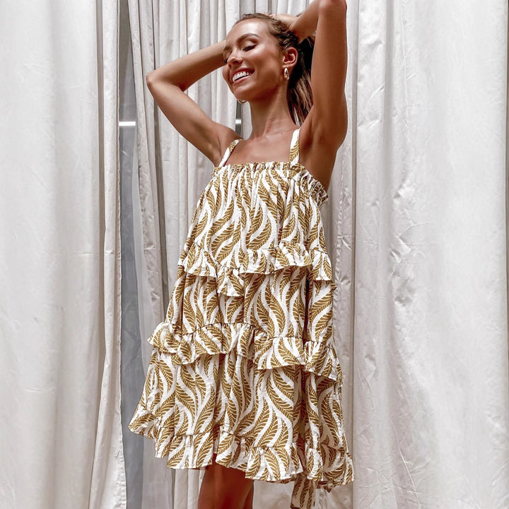 Women's Airy Beach Dress with Voluminous Skirt and Ruffle Details Lune London