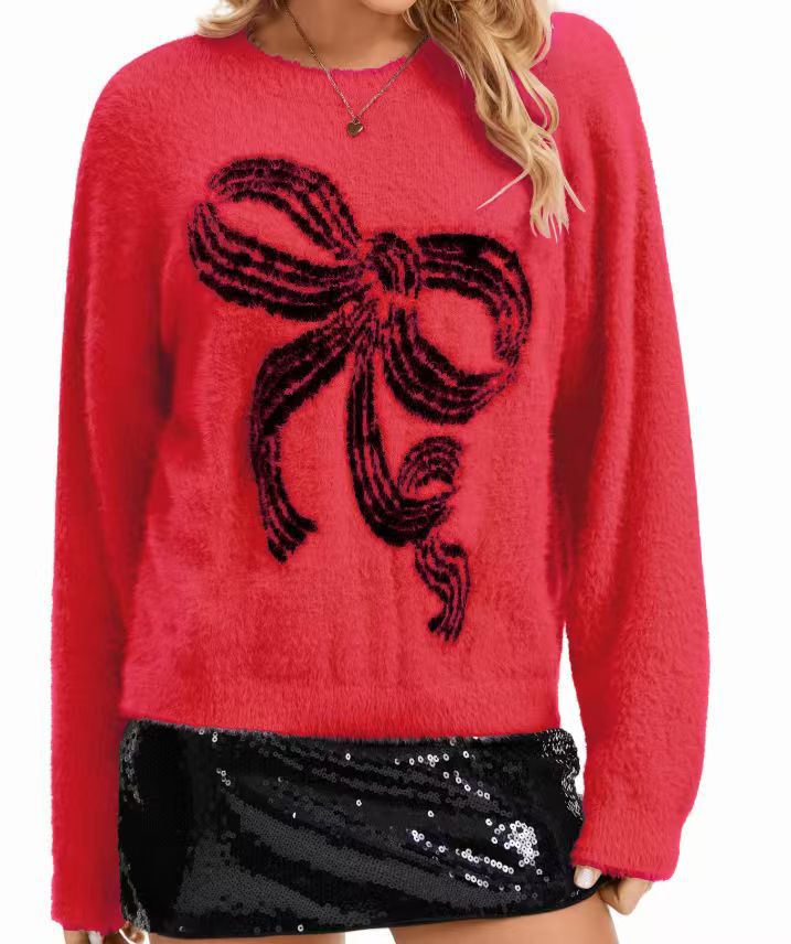Pull femme avec motif nœud ludique et matière douce Chic & Stil
