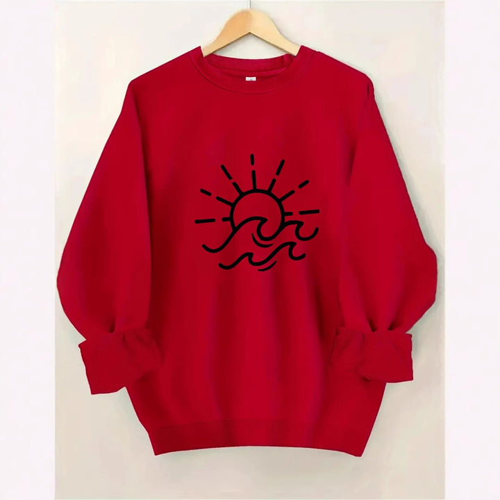Sweat-shirt pour femmes avec un design créatif de soleil et de vague Chic & Stil
