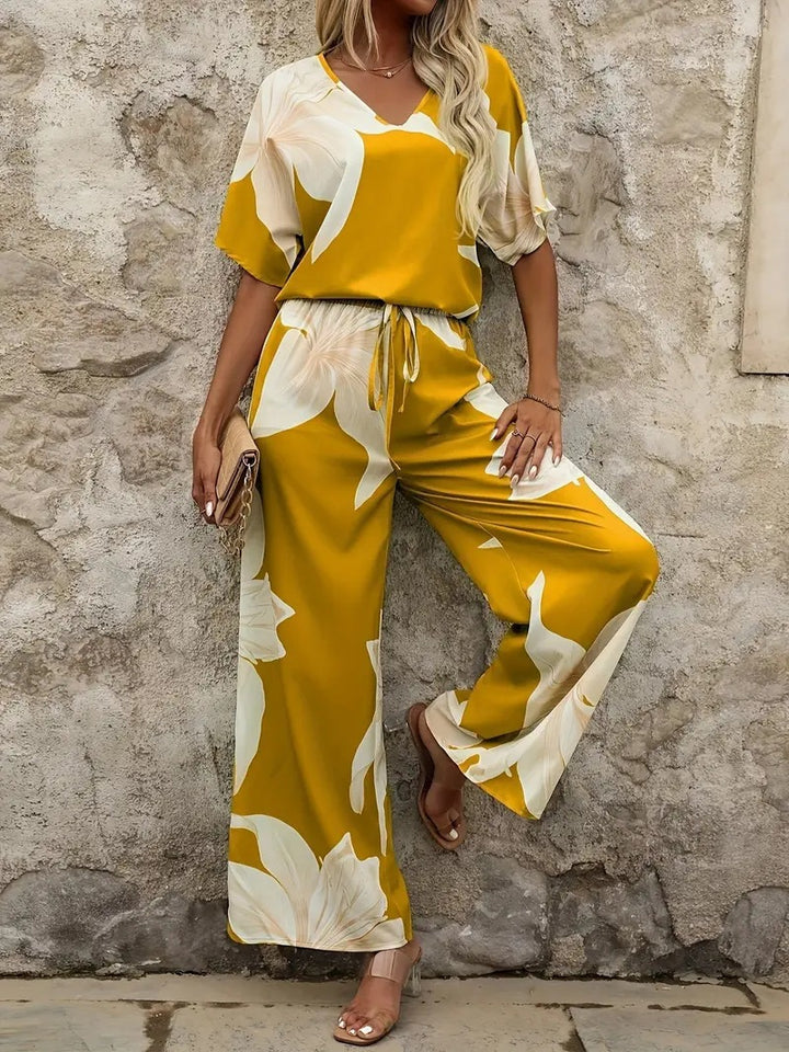 Ladies Elegant Jumpsuit with floral patterns and wide leg Lune London
