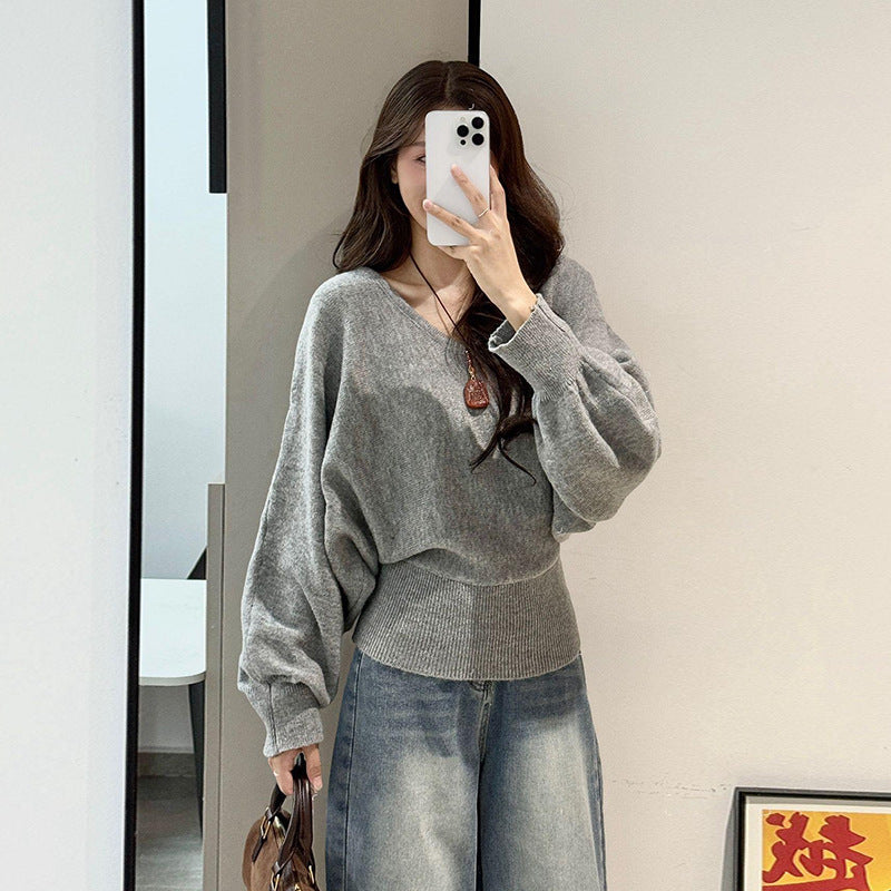 Pull moderne pour femmes avec col en V et ceinture à nouer optionnelle Chic & Stil