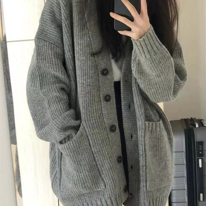 Oversized knit jacket for women with button closure and practical pockets Lune London