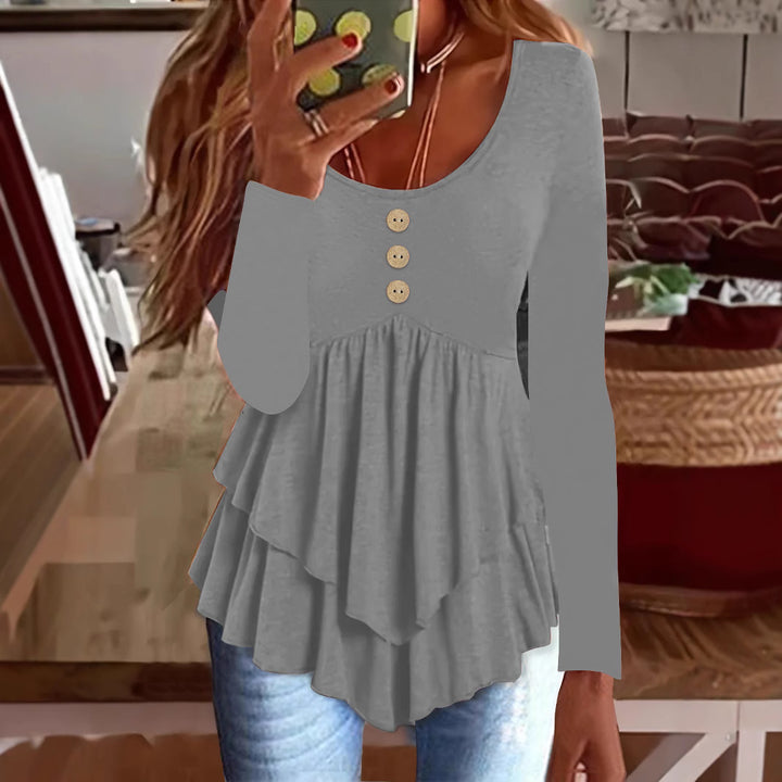 Long sleeve women's blouse with layered design and decorative button details Lune London