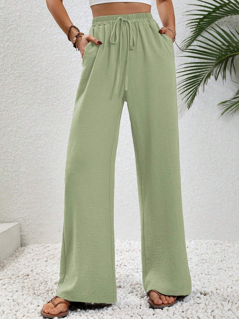Loose-fit leisure pants for women with an elastic waistband and practical side pockets Lune London