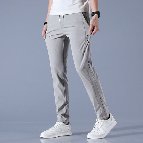 Sports jogger pants for men with elastic waist and practical zip pockets Lune London