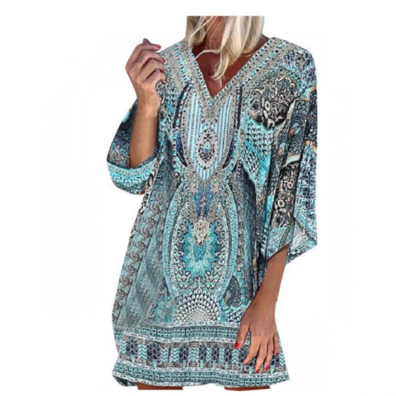 Light kaftan dress for women with a deep V-neckline and bell sleeves Lune London