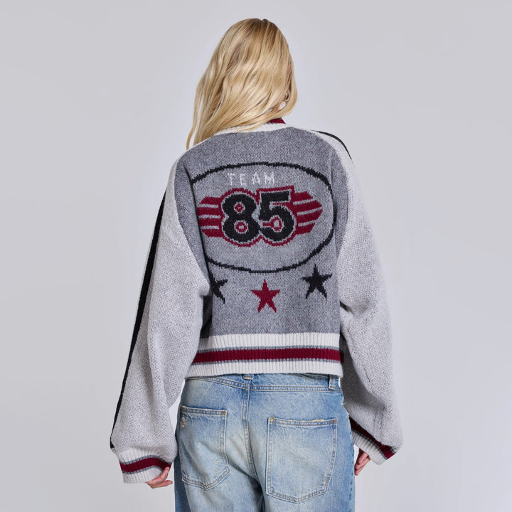 Women's stylish and comfortable knitted sweater with team emblem Chic & Stil
