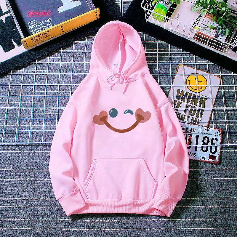 Women's hoodie with cheerful smiley design Chic & Stil
