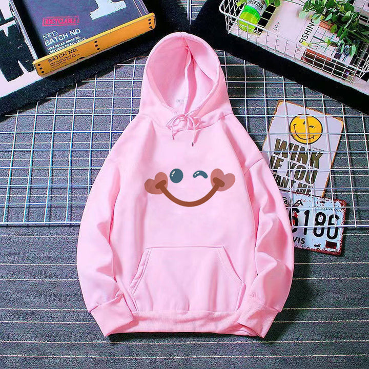 Women's hoodie with cheerful smiley design Chic & Stil