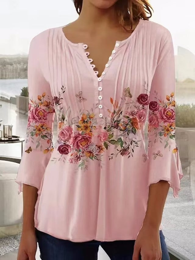 Blouse pour femmes avec imprimé floral et détails de boutons Chic & Stil