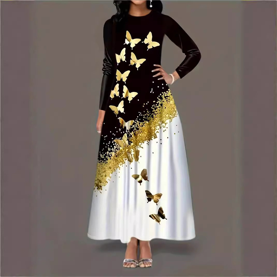 Maxi dress for women with an elegant butterfly pattern and a sparkling gold accent Lune London