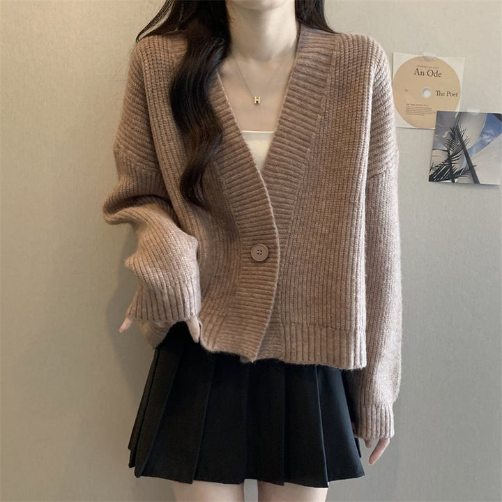 Cardigan tendance femme avec décolleté en V profond et fermeture à boutons Chic & Stil