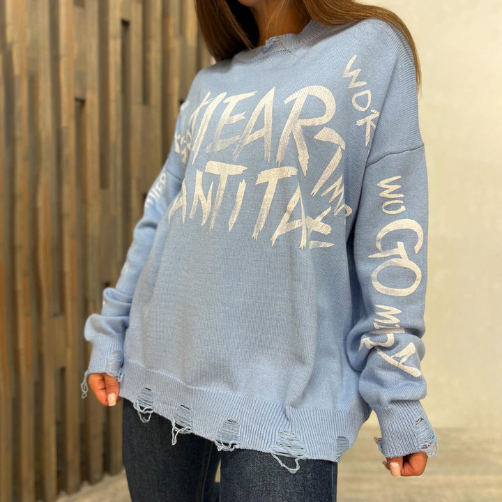 Oversized sweatshirt for women with creative inscription and trendy ripped details Lune London