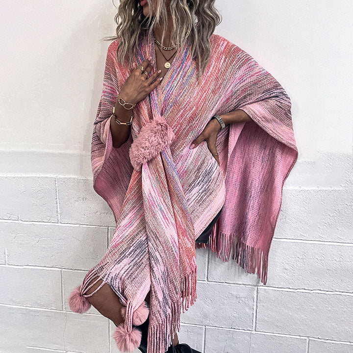 Ladies fashionable poncho with luxurious faux fur trim and creative fringes Lune London