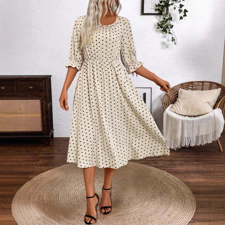 Lune London puff sleeve midi dress with an elastic waist