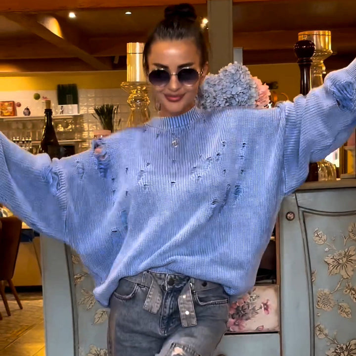 Casual women's sweater with a trendy ripped design and voluminous sleeves Lune London