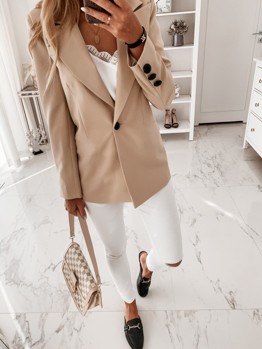 Elegant oversized jacket for women with structured details and long sleeves Lune London