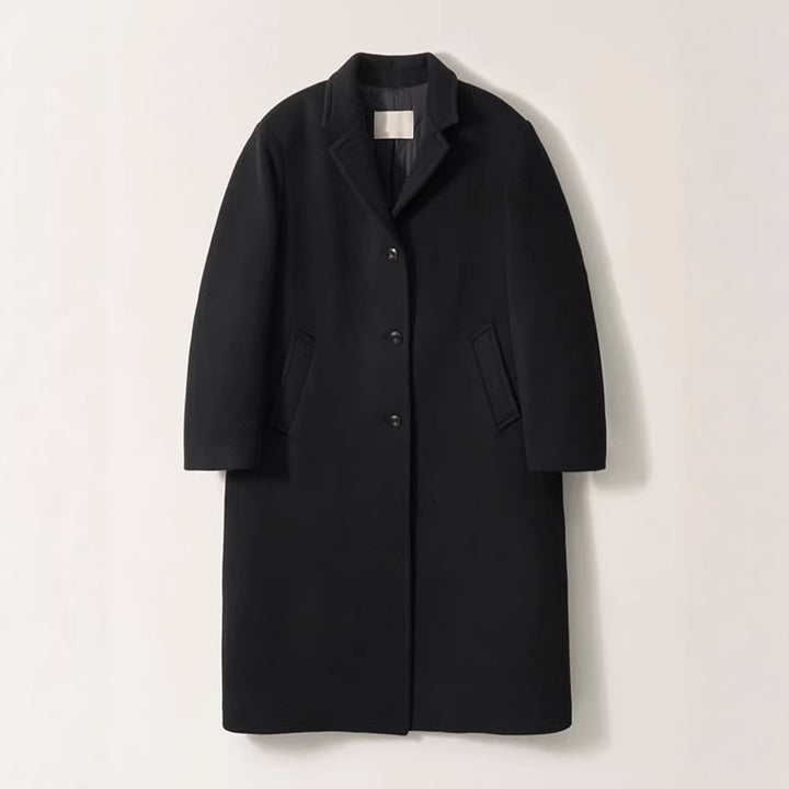 Manteau long élégant pour femme avec des revers tendance et des poches plaquées Chic & Stil